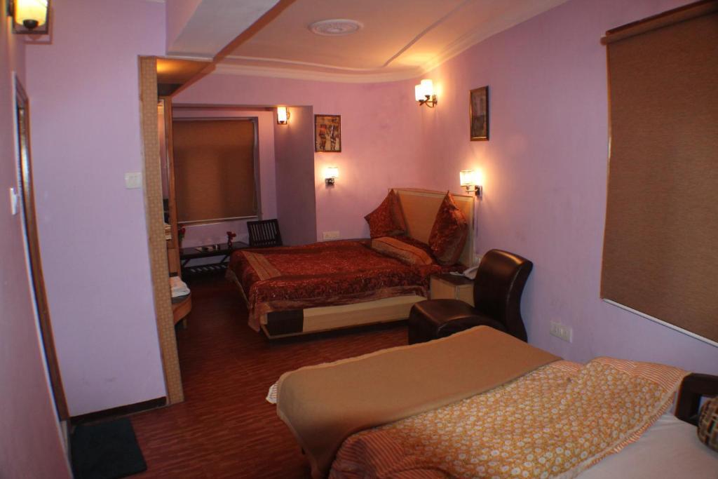 Hotel Prestige Shimla Oda fotoğraf
